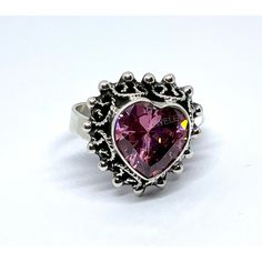 Enchant your look with our stunning pink Heart Zirconia Adjustable Ring. This artisan style ring is crafted with high-quality sterling silver 925, making it a timeless and elegant addition to your jewelry collection. Pink Heart Ring, Pink Heart Rings, Ring Exchange, Chocolate Cherry, Adjustable Ring, Adjustable Rings, Pink Heart, Silver 925, Heart Ring