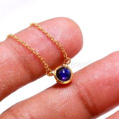 Natural Blue Sapphire 18k Solid Gold Charm, Sapphire Pendant Necklace, Handmade Gold Necklace, September Birthstone Necklace, Gold Charm Necklace, Gift For Mom Charm Necklace, Gift For Partywear Necklace, Gift For Her Necklace Gross Wt -  1.75 Grm  Opal Stone Size-   5x5 mm (Round) Chain  -   Link Chain 1 mm Fish Lock Size-   5 mm Chain Length - 18 Inch Total (With 2-inch Adjustable Extension) Stone -   Natural Blue Sapphire Round Gemstone # SOLID GOLD CHARM NECKLACE# Handmade = yes Marking Blue Birthstone Jewelry In Gold Plated, Blue Birthstone Gold-plated Jewelry, Gold Sapphire Necklace Hallmarked, Gold Tanzanite Jewelry With Bezel Setting, Blue Gold-plated Birthstone Jewelry, Round Tanzanite Jewelry Gift, Hallmarked Sapphire Necklaces As A Gift, Hallmarked Sapphire Necklace For Gift, Handmade Yellow Gold Sapphire Jewelry