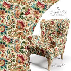 an upholstered chair and footstool with floral fabric