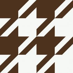 an abstract brown and white pattern with diagonal stripes