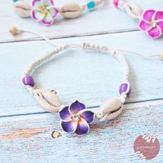 🌺 This playful friendship bracelet is the perfect pop of island vibes. Eye-catching cowry shells with a sparkly handmade plumeria blossom looks so good on this adjustable bracelet. Adjustable bracelet Flowers are hand-made, each unique Real cowry seashells Bracelet Length: 7" to 12" Jewelry pouch included We cannot accept returns on jewelry Bohemian Shell Friendship Bracelets Handmade, Adjustable Bohemian Shell Friendship Bracelets, Adjustable Cowrie Shell Friendship Bracelets For Vacation, Bohemian Cowrie Shell Friendship Bracelets As Gift, Bohemian Handmade Shell Braided Bracelets, Bohemian Cowrie Shell Bracelet Gift, Handmade Bohemian Braided Bracelets With Shell, Handmade Bohemian Shell Braided Bracelets, Handmade Cowrie Shell Friendship Bracelets As Gift