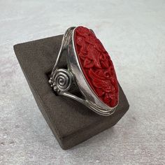 Make A Statement With This Stunning Silver Butterfly Ring From Sajen. The Hand-Carved Cinnabar Adds A Pop Of Vibrant Red Color To Any Outfit, While The 925 Silver Base Ensures The Ring Is Durable And Long-Lasting. The Ring Size Is A Comfortable Adjustable 9, And The Single Gemstone Adds A Touch Of Elegance To The Overall Design. This Ring Is Perfect For Jewelry Lovers Who Want To Make A Bold Statement Without Compromising On Quality Or Style. Great Condition Silver Butterfly Ring, Jewelry Hand, Butterfly Ring, Silver Butterfly, Jewelry Lover, Ring Silver, Vibrant Red, Womens Jewelry Rings, Red Color