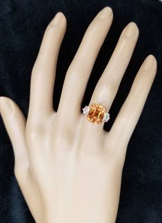 Gorgeous VINTAGE 14K ROSE GOLD ORANGE SPINEL RING SET CENTER NATURAL ORANGE SPINEL IN EMERALD CUT WEIGHT 7.95 CARAT SIZE 11x9MM GORGEOUS COLOR AAA RATED!! CLEAN ,VERY NICE CUT ,AMAZING BRILLIANCE FULL OF FIRE, SPARKLY. SIDE SET TWO NATURAL ROUND DIAMONDS WEIGHT 0.98CT size 5mm H-SI1 RING size 4.5 Resizable Retail value $9,500 net. Appraisal available Orange Sapphire Ring For Formal Occasions, Fine Jewelry Orange Sapphire Anniversary Ring, Orange Sapphire Ring For Anniversary, Formal Orange Topaz Ring With Diamond, Elegant Hallmarked Orange Topaz Ring, Elegant Orange Topaz Ring Hallmarked, Heirloom Orange Jewelry For Anniversary, Elegant Formal Orange Topaz Ring, Formal Orange Hallmarked Jewelry