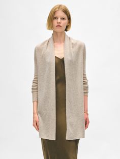 The longest-running piece at White + Warren, the Cashmere Trapeze Cardigan is a chic fingertip-length open sweater that works on every body type. No matter what color you choose, you'll want to wear this timeless style season after season. Details Straight fit. Long sleeve. Length in size small is 32.5" The model is 5'9" and is wearing a size small. 100% Cashmere Hand wash cold or dry clean. Do not twist or wring. Reshape and lay flat to dry. Warm iron if needed. Style #11092 Open Sweater, No Matter What, Timeless Style, You Choose, Lay Flat, Timeless Fashion, Cashmere, Matter, Dry Clean