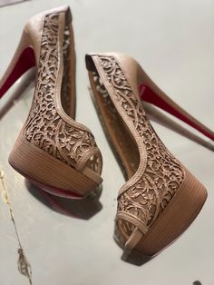 Stunning Christian Louboutin platform peep toe pumps. Features laser cut floral design, stacked stiletto heel, and the iconic Louboutin red bottoms. Designer - Christian Louboutin  Size EU 39.5 Approximate measurements: Sole length: 10" Platform height: 1.25" Total Heel height: 6" Louboutin Red Bottoms, Louboutin Heels, Womens Pumps, Christian Louboutin Heels, Red Bottoms, Stiletto Heel, Womens Heels, Shoes Women Heels, Stiletto Heels