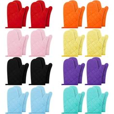 oven mitts are lined up in different colors