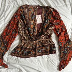 Nwt Free People Size: Xs Color: Red Combo Vintage V-neck Top With Boho Print, Fall Boho Print V-neck Tops, Red Printed V-neck Blouse, Red Bohemian Fall Blouse, Red Long Sleeve Bohemian Blouse, Red V-neck Blouse For Fall, Brown Bohemian V-neck Top, Vintage Long Sleeve Tops With Boho Print, Red Boho Print V-neck Top