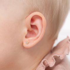 These beautiful clear prong set cubic zirconia earrings were crafted in 14k yellow gold perfect for babies and little girls with sensitive ears. High polished for long lasting shininess and durable quality, these classic and timeless earrings for girls come with screw backs which is a safety back that screws on and locks thus preventing for any poking in the back of the earlobe and lessening chances of lost earrings. Gift box included. Dainty Hypoallergenic Diamond Earrings Round Cut, Hypoallergenic Dainty Diamond Earrings Round Cut, Dainty Hypoallergenic Round Cut Diamond Earrings, Hypoallergenic Dainty Round Cut Diamond Earrings, Gold Earrings For Baby Girl, Baby Studs Earrings Gold, Newborn Earrings Gold, Infant Gold Earrings, Toddler Earrings