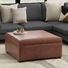 a couch and ottoman in a living room