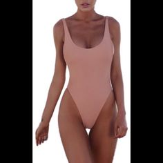 Women One-Piece Monokini Swimwear Push-Up Padded Bikini Swimsuit Bathing Suit, Size L In Blush. Never Worn, Still In The Bag It Was Shipped In. No Tags (Came That Way) Solid One-piece Leotard With Lined Body, Solid One-piece Lined Leotard, Seamless One-piece Bodysuit For Pool, Fitted Solid Bodysuit For Beach Party, Fitted Solid Color Bodysuit For Beach Party, One-piece Bodysuit For Sunbathing, Solid Bodysuit For Sunbathing With Lined Body, Solid Seamless Bodysuit For Sunbathing, Solid Color Swimming Bodysuit With Lined Body