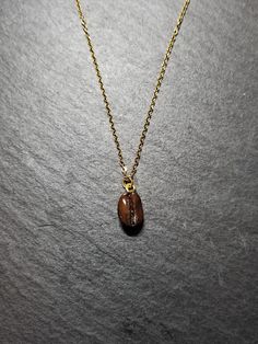 This beautiful necklace is a wonderful idea for gift giving and as a little gift for yourself. The coffee bean is approximately 11mm x 8mm. Please choose your chain length preference in the drop down box. See more jewellery here: https://www.etsy.com/shop/simplysweetjewellery I'm happy to help you find what you're looking for! Please feel free to message me with any questions. Thank you for shopping at Simply Sweet Jewellery! PLEASE NOTE: Colours may not look the same as on your computer - Avoid Minimalist Brown Necklaces For Gifts, Minimalist Brown Necklace For Gifts, Minimalist Brown Necklace For Gift, Nickel-free Brown Necklace For Gift, Personalized Brown Necklace For Gift, Handmade Coffee Colored Jewelry For Gifts, Handmade Coffee-colored Jewelry For Gift, Bean Necklace, Sweet Jewelry