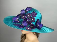 "This is a one of a kind hat. It is my own unique design. Vogue hats are perfect for horse racing events, church, the Kentucky derby, weddings, garden tea parties and charity events. There is a tie on the inside of the hat that helps adjust the size from large to small. 100% Brand new, hand made and high quality. Material: Satin Brim is 5\" Please feel free to ask me any questions or special requests. I have designed & created each piece in my shop. All pieces are securely wrapped & boxed to pre Custom Formal Hat For Kentucky Derby, Custom Hat For Kentucky Derby, Handmade Mini Hat For Kentucky Derby Evening, Fitted Turquoise Hat For Party, Turquoise Fitted Hat For Party, Turquoise Fitted Party Hat, Elegant Handmade Blue Hats, Spring Party Mini Hat In Turquoise, Turquoise Mini Hat For Kentucky Derby Races