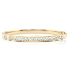 "This bangle is made with 2.12 Ct. SI Clarity G-H Color Natural Diamond Solid 18K Yellow Gold Channel Setting Bangle Bracelet Handmade Dainty Jewelry. * SKU: SGBN00084 * Made to Order. * Gold Purity: 14K Solid Yellow Gold (stamped) * Custom Gold Color: Rose Gold, Yellow Gold, White Gold * Custom Gold Purity: 9K/14K/18K (Charges Apply) * Diamond 100% Genuine Diamond * Diamond Weight: 2.12 ct. * Diamond Color: G-H * Diamond Clarity: SI1- SI2 * Diamond Cut: Brilliant Cut (Excellent) Product Measure Diamond White Channel Set Diamond Bracelet For Wedding, Round Diamond Bracelet With Channel Set, Wedding Diamond White Channel Set Bracelet, Elegant Wedding Diamond Bracelet Channel Set, Channel Set Diamond Bracelet For Wedding, Elegant Wedding Tennis Bracelet With Channel Set, Wedding Channel Set Diamond White Bracelet, Fine Jewelry Diamond Bracelets With Channel Set, Luxury Channel Set Diamond Bracelet For Wedding