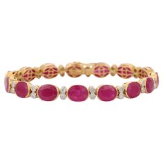 This Ruby and Diamond Bracelet in 18K gold showcases 29.6 carats of endlessly sparkling natural ruby and 1.3 carats of diamond. It measures 7.5 inches long in length. Ruby improves mental strength. Designed with oval cut ruby and diamond set in solid gold settings to make you stand out on any occasion or event. The elegant style complements the attire beautifully and is a perfect july birthstone bracelet, Engagement Gift, Bridal Shower Gift, Gift For Love, Gift For Sister, Mother Daughter Gift,