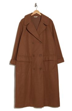 Look perfectly classic on your chilly commutes wearing this distinguished double-breasted long coat styled with flap pockets.  52" length Double-breasted button closure Notched collar Front flap pockets 88% polyester, 9% rayon, 3% spandex Machine wash, dry flat Imported Steve Madden Sneakers, Double Breasted Coat, Sweaters And Leggings, Suit Separates, Short Suit, Comfortable Sandals, Jogger Jeans, Notched Collar, Jogger Sweatpants