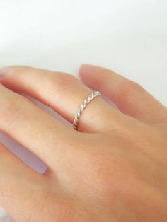 Stackable Twisted Rings For Promise, Modern Twist Stackable Rings For Promise, Modern Twist Stackable Twisted Promise Rings, Modern Twisted Shape Promise Ring, Modern Twist Twisted Promise Ring, Modern Twisted Promise Ring, Minimalist Adjustable Twisted Rings, Minimalist Twisted Rings For Everyday Wear, Twisted Stackable Promise Rings