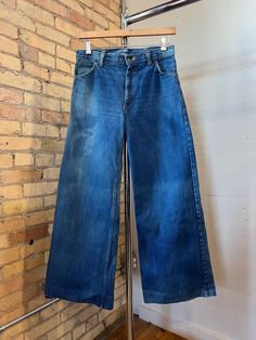 Has some wear and sun fading throughout  32" Waist  11.5" Rise  40" Hip  30.5" Inseam All sales final, please ask any questions before buying - Thank you Jeans Bell Bottoms, Jean Large, Faded Jeans, Bell Bottoms, 1970s, Gender Neutral, Art Collection, Wide Leg, Bathing Beauties