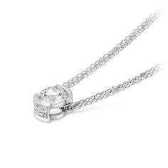 Modern and sophisticated, this necklace is a captivating look any woman would adore. Beautifully crafted, this ring features a dazzling 0.77 carat center stone placed prominently in an 18K white gold half-bezel setting that enhances the diamond's size and sparkle.  This classic look is one she'll turn to often, everyday and on special occasions. An amazing and thoughtful anniversary gift for your loved one.
0.77 Classic diamond pendant set in 18K white gold
Center Diamond:&nb Diamond Pendant Set, Half Bezel Setting, Half Bezel, Diamond Pendant Sets, Gold Link Chain, Pave Pendant, Gold Link, Diamond Star, Tennis Bracelet Diamond