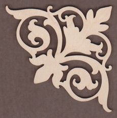 a wooden cutout of an ornate design on a brown background with the word's name