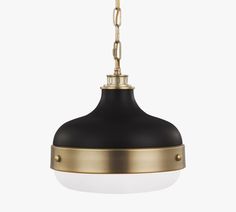 a black and gold pendant light with a white ball hanging from the top of it