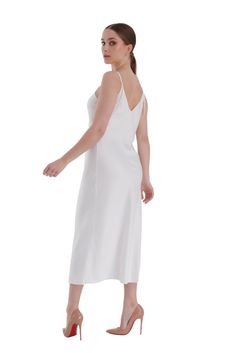 Finally – a slip dress that fits. Specifically designed to flatter in all the right ways, the sustainably silky Midi Slip dress features adjustable straps, a modern v-neck, and a calf-length. Personalized Sizes We offer 1,260 precision sizes within the standard sizes 00-40. Take our 60-second Fit Quiz or Body Scan to find your perfect-fitting size. Material 100% Polyester Care Machine wash cold. Lay flat to dry. Low temperature iron. Perfect Fit Guarantee We are committed to the perfect fit. Wea Body Scan, Body Scanning, Midi Slip Dress, Dress Satin, Satin Slip Dress, Body Shapes, Lay Flat, Adjustable Straps, Slip Dress