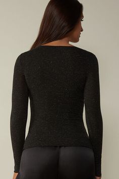 Long sleeve bateau neck top in soft modal ultralight with cashmere and lamé thread. Elegant Fitted Long Sleeve Top With Crew Neck, Elegant Fitted Crew Neck Long Sleeve Top, Elegant Fitted Long Sleeve Crew Neck Top, Fine Knit Tops For Night Out In Winter, Elegant Crew Neck Long Sleeve Top For Winter, Elegant Seamless Crew Neck Tops, Elegant Seamless Tops For Winter, Elegant Seamless Winter Tops, Winter Seamless Crew Neck Top