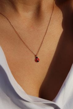 Ladybug to give you all the luck 🐞  Get this beautiful minimalist jewelry made with the quality of perfect elements✨ You can choose 925K Sterling Silver with the options of Gold, Rose Gold or White Gold colors. High quality jewelry for everyone 🤍  Details * 925K Sterling Silver Option → 14K Gold, Rose Gold or White Gold plated * Chain length is approximately 18 inches (16+2 in extender) / 45 cm (40+5 cm extender) * Time is everything! You will receive your package as soon as possible 🚚  * We care about the quality of metal to make sure it will last for a long time * We use enamel technique to color the jewelry and high quality zircons only * There can be tiny differences on each item. Length difference of the chain as well as color changes and shade differences of the stones and enamel Ladybug Beaded Necklace, Tiny Rose Gold Jewelry Gift For Her, Ladybug Necklace, Ladybug Jewelry, Cute Ladybug, Luck Necklace, A Ladybug, Handmade Gold Jewellery, Fancy Jewellery Designs