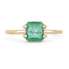 Displayed is a custom emerald solitaire asscher-cut ring in 14K yellow gold. This gorgeous solitaire ring carries a 1.0-carat emerald in a four-prong setting. The emerald has very good clarity with minor flaws that are normal in all genuine emeralds. The gem has a beautiful green color and very good luster. An ideal solitaire, perfect for everyday use! Setting Style: Prong Setting Material: 14K Yellow Gold Setting Weight: 1.6 Grams Main Stone: Emerald Shape: Asscher Cut Weight: 1.0-Carats Clarit Gia Certified Octagon Emerald Ring, Timeless 14k Gold Emerald Cut Ring, 14k Gold Octagon Emerald Ring With Bezel Setting, Fine Jewelry Octagon Solitaire Rings, Fine Jewelry Octagon Emerald Ring, 14k Gold Asscher Cut Diamond Ring With Gemstone, 14k Gold Jewelry With Asscher Cut Gemstone, Gia Certified Timeless Octagon Emerald Ring, 14k Gold Octagon Emerald Ring Fine Jewelry