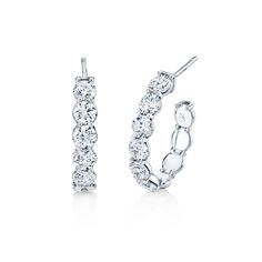 Elevate your style with our Diamond Open Ended Hoop Earrings, available in 18k white gold or 18k yellow gold. Sparkling round diamonds adorn these exquisite earrings, adding a touch of luxury and sophistication to any ensemble. Make a statement with these timeless beauties. Oval Hoop Earrings, Open Ended, Diamond Hoop Earrings, Oval Diamond, White Gold Diamonds, Timeless Beauty, Round Diamonds, Gold Diamond, Hoop Earrings