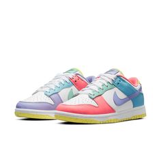 This Nike Dunk Low "Easter" is dressed in a Green Glow, Sunset Pulse, and White color hue. It features White leather across the base while various pastel shades land on the overlays. At the bottom, each is completed by a white midsole and a yellow outsole with red and blue flecked detailing. SKU: DD1872-100 Release Date: Spring 2021 Color: White/Green Glow-Sunset Pulse Candy Dunks, Dunks Shoes, Jordan 11 Retro Low, Nike Models, Womens Air Jordans, Easter Candy, Air Jordan 6, Shoes Running, Basketball Sneakers