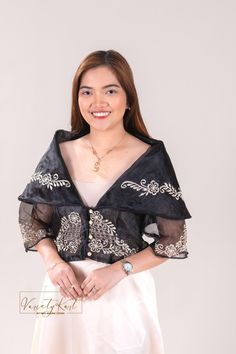 Modern Maria Clara Top Kimona Elevate your style with our modern twist on the classic Maria Clara top, featuring an embroidered design on luxurious organza fabric. Choose from three sophisticated color options: Black with Mocha Embroidery: A striking combination of sleek black and warm mocha embroidery adds a touch of sophistication to your outfit. All Mocha: Rich, mocha fabric with intricate mocha embroidery creates a beautiful, monochromatic look. Mocha with Black Embroidery: A beautiful contr Modern Maria Clara Outfit, Maria Clara Outfit, Modern Maria Clara, Filipiniana Top, Filipiniana Dress, Maria Clara, Black Embroidery, Organza Fabric, Embroidered Design