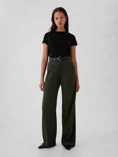 Soft woven trousers.  E-waist with concealed hook and bar closure, zip fly.  Front slant pockets, back welt pockets.  Pleating at front.  * Fit: Classic.  An easy silhouette that fits close  at the waist, and is relaxed through the hips and thigh.  Models wearing Gap Green Business Pants, Hip Business Casual, Business Casual For Nurses, Styling Green Trousers, Massage Therapist Outfits For Women, Women’s Work Wear, Transmasc Formal Wear, Women’s Slacks, Green Slacks Outfit