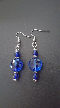 Elegant Blue Faceted Crystal Earrings, Sapphire Crystal Drop Earrings, Silver Crystal Beaded Drop Earrings, Blue Crystal Drop Earrings, Blue Drop Crystal Earrings, Silver Faceted Dangle Crystal Earrings, Round Crystal Earrings With Faceted Beads, Silver Round Crystal Earrings With Dangling Beads, Blue Faceted Round Earrings