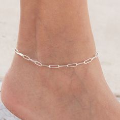 The Strauss Sterling Silver Anklet is an Easy chic anklet comfortable to wear and timeless in design. This elegant piece coordinates beautifully with many styles from our Silver and Gold mix Collection. Sterling Silver Chain Sterling Silver Clasp SIZING INFO - Measure where on your ankle you want your anklet to lay. You can round 'up' to the nearest size for comfort, (or not if you want a snug fit). Don't see your size? We can make it for you! Please email customerservice@lizzyjames.com for more Silver Chain Anklet, Silver Anklet, Easy Chic, Sterling Silver Anklet, Silver Anklets, Chain Anklet, Sterling Silver Chain, In Design, Sterling Silver Chains