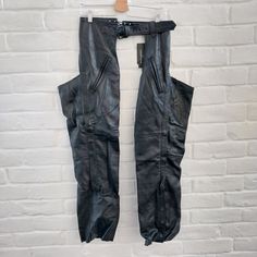 Want To Save On Shipping And Have A 15% Discount? Bundle 2 Or More Items (Clothes, Shoes, Accessories, Home, Etc.) From My Closet And Get 15% Off Automatically! Ride In Style With These Black Leather Chaps From Open Road. Designed For Motorcycle Enthusiasts, These Chaps Are Perfect For Cruising On Your Cruiser. The Chaps Come In Size M And Have An Adjustable Belt For A Comfortable Fit. They Also Feature Two Pockets For Storing Small Personal Items While On The Road. Made From High-Quality Leather, These Chaps Are Built To Last And Have A Vintage Look That Adds To Their Charm. They Are Easy To Care For With Specialist Leather Care And Can Be Worn In All Seasons. These Straight Leg Chaps Have Biker Cowboy, Black Leather Jeans, Motorcycle Chaps, Leather Chaps, Brown Leather Pants, Mens Leather Pants, Motorcycle Pants, Cowboy Rodeo, Leather Jeans