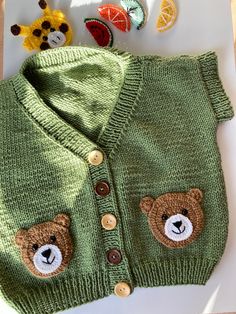 Stylish Green Jacket with Teddy Bear Embroidery! 🧸🌿 Elevate your style with Teddy Bear embroidery! This green jacket is a must-have for your wardrobe. With its comfortable fit and unique embroidery, it complements any outfit. Perfect for both casual and special occasions! Order now and add a touch of style to your look! 🛍️💚 Green Cotton Sweater With Button Closure, Cute Green Cotton Sweater, Cute Green Embroidered Tops, Embroidered Green Winter Outerwear, Embroidered Green Outerwear For Winter, Embroidered Green Outerwear For Fall, Cute Green Fall Cardigan, Cute Green Winter Outerwear, Embroidered Green Cotton Outerwear