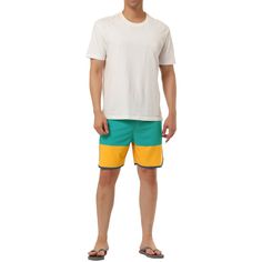 These colorblock board shorts are perfect for adding colors to your summer wardrobe. They're made of lightweight material that's durable yet comfortable for all-day wear. These trendy color block design beach shorts can be paired with different short-sleeved tops for sunbathing, beach games, or surfing. Whether you're lounging in the sun or swimming, or beach volleyball, these color block board shorts are a stylish choice. Casual Summer Shorts With Contrast Color, Casual Color Block Bottoms For Summer, Summer Cotton Shorts With Contrast Color, Cotton Shorts With Contrast Color For Summer, Multicolor Contrast Color Bottoms For Summer, White Surfing Shorts For Summer, Summer White Color Block Shorts, Green Color Block Beach Bottoms, Green Color Block Bottoms For Beach