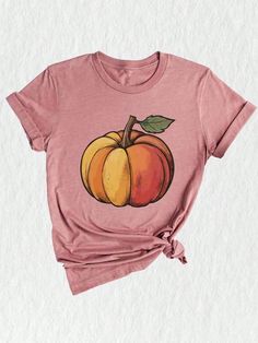 Introducing our exclusive Fall Shirt, the perfect addition to your autumn wardrobe! This stunning tie-dye shirt features a delightful design inspired by the cozy vibes of the season. With its vibrant colors and unique patterns, it's the epitome of Fall Clothing and will surely make a statement wherever you go.

Are you looking for the perfect Thanksgiving Shirt to wear while spending quality time with your loved ones? Look no further! Our Fall Shirt not only embodies the essence of autumn but al Plant Texture, Cute Fall Shirt, Peach Shorts, Halloween Letters, Thankful Shirt, Watercolor Pumpkins, Thanksgiving Family, Pumpkin Colors, Pumpkin Shirt