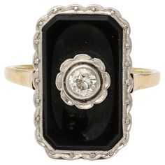 This Art Deco 14k bi -Color gold ring is set with a central rectangular cut black onyx displaying a single old European cut diamond set in 14 white gold in a stylized geometric design This ring could be worn to everything from a black tie event or with jeans and a t shirt . It is ring size 7.5 but the buyer can have a jeweler size to suit . Excellent Vintage condition. American Circa 1925 Memorial Ring, Custom Memorial, Black Tie Event, European Cut Diamonds, Diamond Set, Color Ring, Black Tie, Black Onyx, Geometric Design