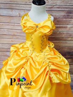 Beautiful gown fit for a real princes. It's made from scratch , the back is corset style so it's ajustable. If you want other princess , just let me know and I'll be happy to design it for you. It takes 3-4 weeks to be ready. I'll ship USPS priority mail which takes 2-3 days to arrive. Plan for the timing. If you need a rush order, contact me and I'll let you know if it's posible. I'll add the tracking number here as soon It's shipped, keep in mind I have no control of the package from that poin Princess Dress With Sweetheart Neckline, Pageant Ball Gown Dress With Corset Back, Pageant Ball Gown With Corset Back, Corset Back Ball Gown For Pageants, Yellow Ball Gown With Fitted Bodice, Gold Princess Pageant Dress For Dress-up, Fitted Princess Dress With Corset Back, Gold Gown With Fitted Bodice For Pageant, Fitted Bodice Princess Dress With Sweetheart Neckline For Pageant