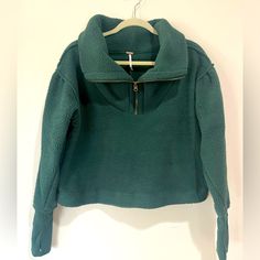 This Sweatshirt Is Adorable, It Has An Oversized Collar With A Half Zip In The Front. It’s Sherpa With Details On The End Of The Sleeve To Make It More Fitted. The Color Is Forest Pine And The Size Is A Small. This One Is New With Tags. Trendy Oversized Half-zip Top, Green Comfy Tops For Fall, Comfy Green Tops For Fall, Green Fleece Tops For Loungewear, Green Fleece Loungewear Top, Green Fleece Top For Loungewear, Green Half-zip Winter Top, Winter Half-zip Green Tops, Comfy Green Winter Tops