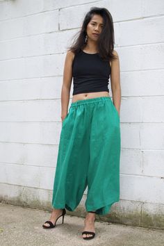 M E A S U R E M E N T S Waist 26 in. up to 40 in. (max with elastic band) Hips up to 54 in. Wide leg circumference 30 in. Inseam 23 in. Pocket 2 pockets Total length 35 in. Material High quality linen fabric M O D E L * Size US4 * Height 5 ft. 4 in. or 163 cm. With or without 4 in. high heels. These pants are a new addition to our linen pants collection. They're made with high quality linen with high end detailing and are tailored to make you look and feel your best! The pants are very roomy wit Green Relaxed Fit Full-length Parachute Pants, Green Relaxed Fit Parachute Pants, Green Baggy Ankle-length Harem Pants, Green Summer Harem Pants With Pockets, Green Wide-leg Harem Pants For Summer, Green Wide Leg Harem Pants With Pockets, Green Full-length Parachute Pants For Summer, Green Wide Leg Pants For Summer, Green Relaxed Fit Harem Pants With Elastic Waistband