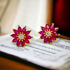 🌺 Fuchsia Flower Crystal Stud Earrings *  Bold Floral Design *  Radiant Statement Jewellery  Brighten up your look with these stunning fuchsia flower crystal stud earrings. Each earring features vivid fuchsia petals arranged in a floral pattern, highlighted by a brilliant central crystal that adds a touch of sparkle. Set in a gold-tone frame, these earrings offer a bold yet elegant aesthetic, perfect for those who love making a statement with their accessories. ✨ Key Features: *Size: Approximat Elegant Rose Red Flower-shaped Earrings, Red Flower Shape Earrings For Party, Red Flower-shaped Earrings For Party, Red Floral Earrings For Party, Red Flower Shaped Party Earrings, Red Flower-shaped Party Earrings, Red Flower Earrings For Valentine's Day, Red Flower Earrings For Mother's Day Gift, Rose Red Flower Shaped Jewelry For Valentine's Day