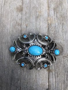 Beautiful metal belt buckles that fit a 1.5” belt strap. Three styles:Turquoise stone - 4” x 3” outer dimensionsScalloped with green diamond - 3.5”x2.75”Celtic knot - 3.5” x 2.1” Adjustable Turquoise Western Belt Buckles, Blue Concho Western Belt Buckles, Western Style Blue Concho Belt Buckles, Western Buckles, Western Belt Buckles, Metal Belt, Green Diamond, Bubblegum Pink, Celtic Knot