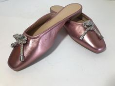 Copper Key pink metallic slip on leather mules,  shoes, Size 7M, Copper Key muted pink metallic slip on flats with aroura borealis rhinestone detail. Pink Slip-on Flats With Flat Heel, Pink Slip-on Mules For Evening, Pink Evening Slip-on Mules, Evening Pink Round Toe Flats, Elegant Pink Slip-on Flats, Pink Party Slippers For Spring, Pink Leather Slip-on Mules, Party Slip-on Flat Mules, Pink Closed Toe Evening Flats