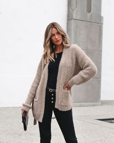 Stay warm and stylish this fall with this must-have cardigan! This Fuzzy Taupe Cardigan is made of soft, fuzzy material with a waist tie strap for a comfortable and stylish fit. Its front pockets add convenience and a modern touch. Layer it over a basic tank top and then pair with your favorite jeans along with some ankle booties and a matching crossbody bag for an elevated chic look! Chic Loungewear Cardigan With Pockets, Chic Winter Cardigan With Pockets, Soft Textured V-neck Outerwear For Fall, Sorority Rush Outfits, Taupe Cardigan, Rush Outfits, Gameday Dress, Casual White Dress, Game Dresses