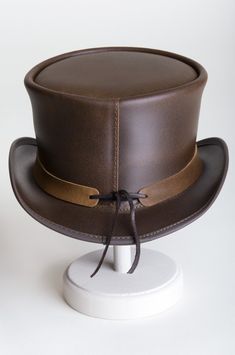 Steampunk El Dorado Leather Top Hat with Buffalo Nickels | Overland Adjustable Leather Fedora With Short Brim, Adjustable Costume Hats With Short Brim For Western Events, Adjustable Costume Hat For Western-themed Events, Adjustable Brimmed Top Hat For Western-themed Events, Classic Top Hat With Flat Crown For Western-themed Events, Leather Hat With Flat Brim For Formal Occasions, Fitted Leather Hat With Curved Brim, Adjustable Leather Fedora, Formal Leather Hat With Flat Brim