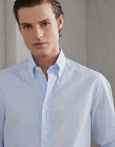 Striped cotton slim fit shirt with button-down collar The quality of the natural yarns elevates the classic feel of this button-down collar shirt . With a smooth, compact hand, the cotton fabric is updated with a striped pattern in the season’s colors. The slim fit offers tapered lines through the chest and shoulders. Elegant Striped Button-up Dress Shirt, Business Casual Striped Shirt With Buttons, Striped Buttoned Shirt For Business Casual, Semi-formal Striped Button-up Shirt, Striped Button-up Top For Semi-formal Occasions, Classic Striped Shirt With Button Cuffs, Elegant Striped Summer Shirt, Classic Summer Shirt With Horizontal Stripes, Classic Shirt With Vertical Stripes For Daywear