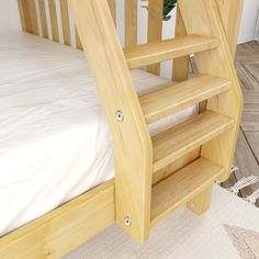 there is a wooden bunk bed with two shelves