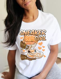 Orange Sneaker Girl design on a 100% cotton Bella canvas shirt Casual Sneakers With Letter Print For Streetwear, Casual Letter Print Sneakers For Streetwear, Casual White Sneakers With Cartoon Print, Casual Sneakers With Letter Print, Sporty T-shirt With Funny Print For Streetwear, Sporty Graphic Print Summer Sneakers, Casual Sneakers With Graphic Print For Spring, Sporty Sneakers With Graphic Print For Summer, Sporty Graphic Print Sneakers For Summer